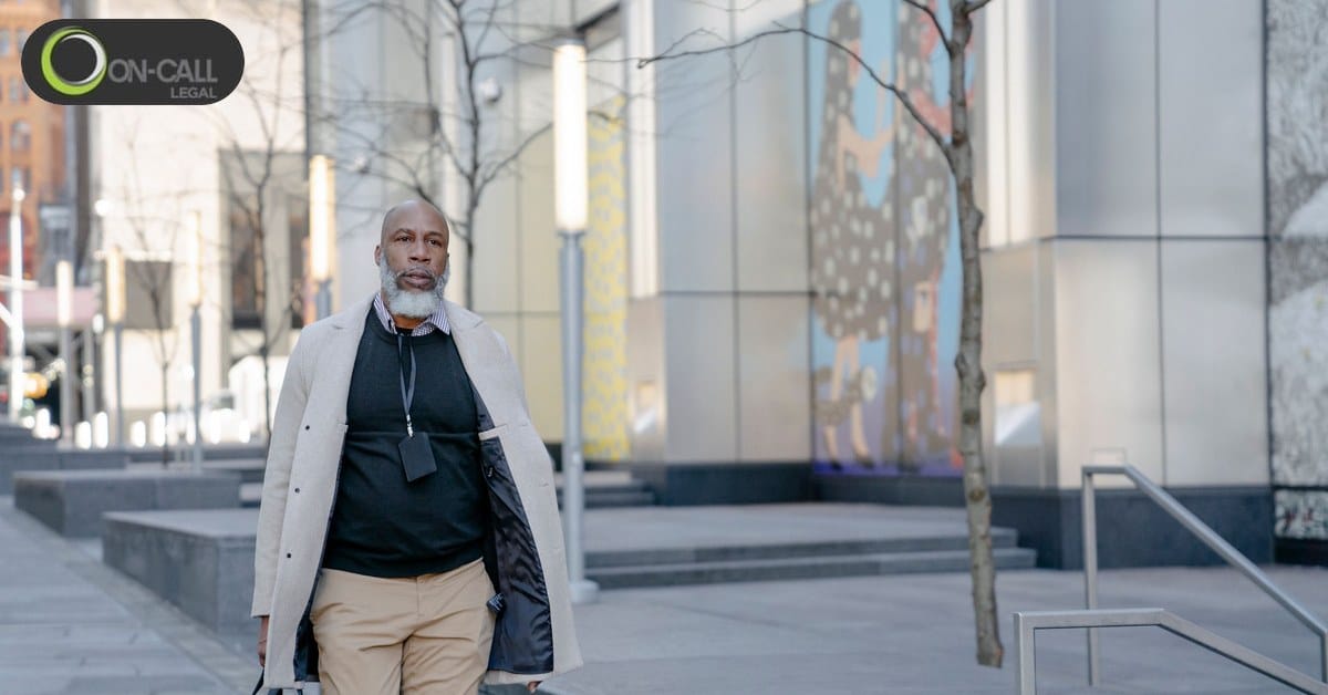 Process server walking a city street while attempting to locate a defendant for service of process