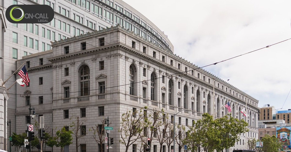 California courthouse building flying the state and national flags