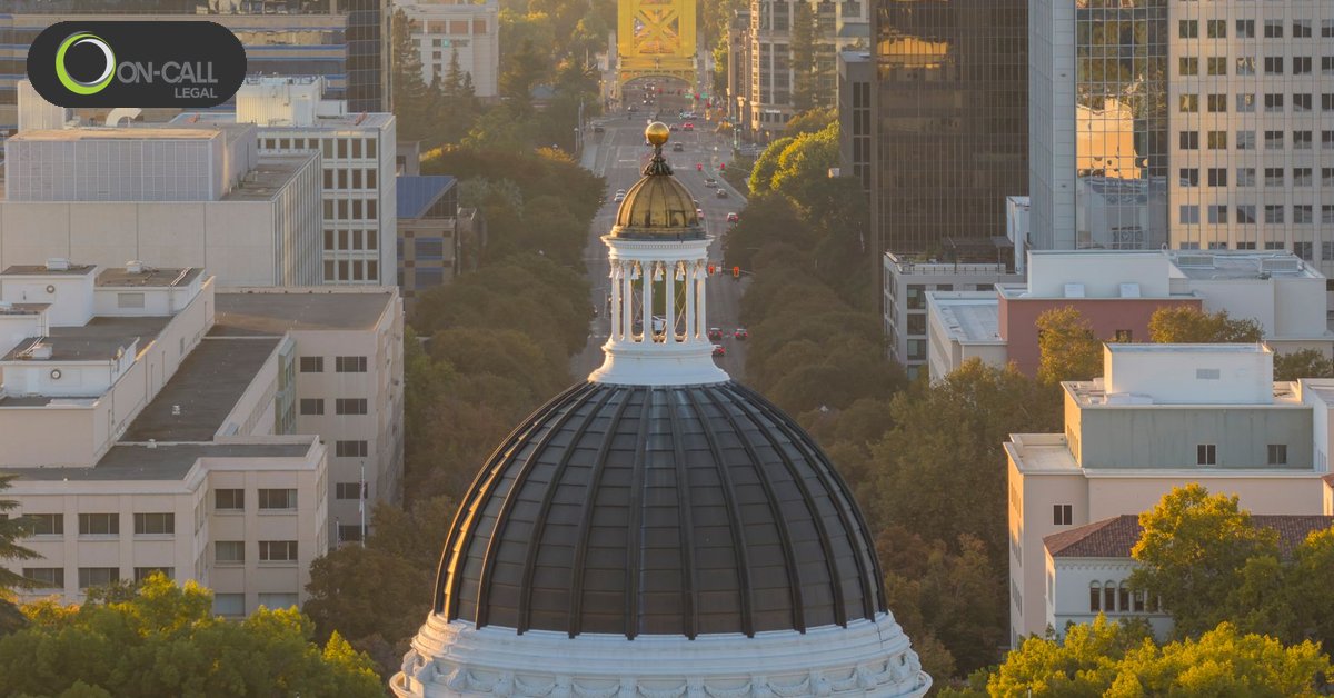 Aerial view of downtown Sacramento with the California State Capitol dome and Tower Bridge at sunset